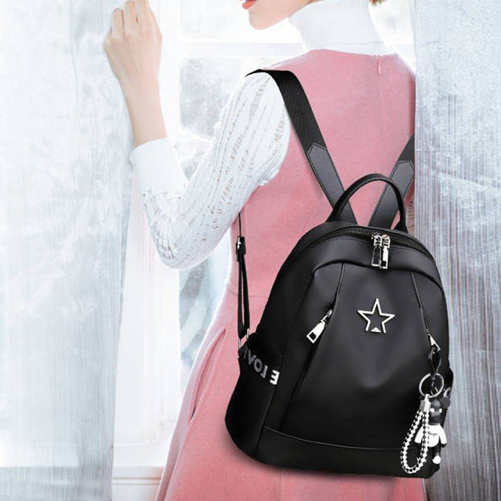 Stylish PU Leather Backpack for Women with star design and anti-theft features, perfect for daily use and travel.