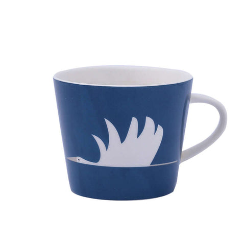 Ceramic coffee mug with white swan design on blue background, Nordic style.